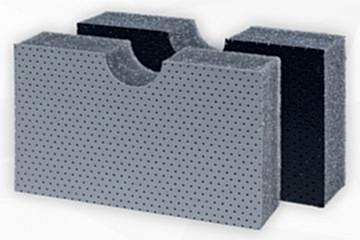 Dunkelgraue Schaumstoffplatte stehend mit gelochter Kunstlederoberfläche