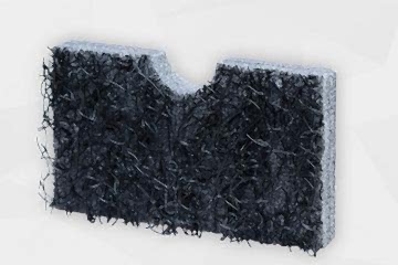 Dunkelgraue Schaumstoffplatte stehend mit Drahtgeflecht auf der Oberseite