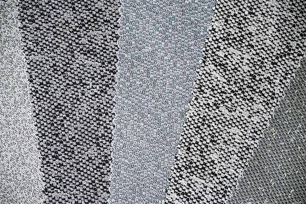 Gepunktete Musterungen verschiedener Vliesoberflächen